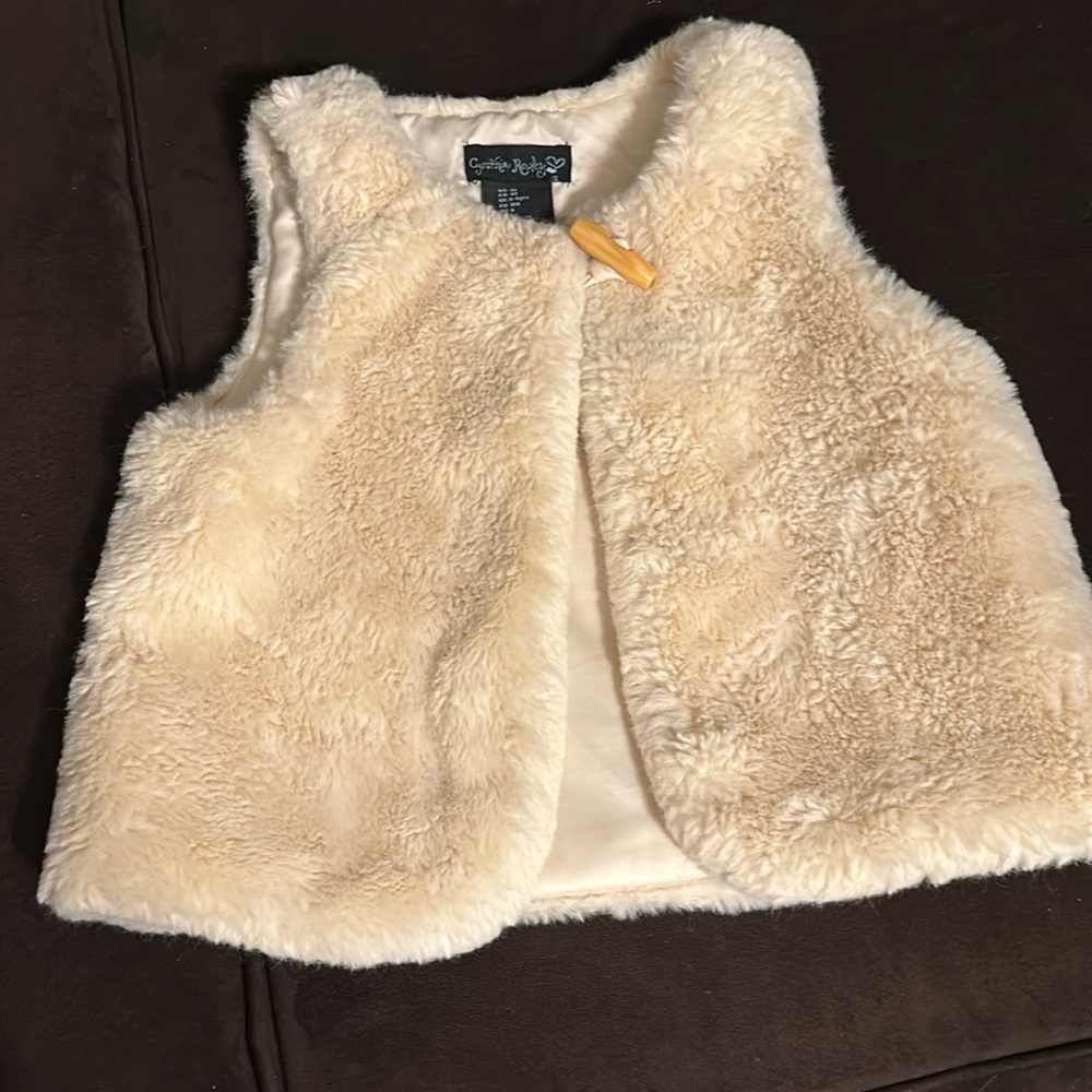 Girls cream colored fuzzy vest